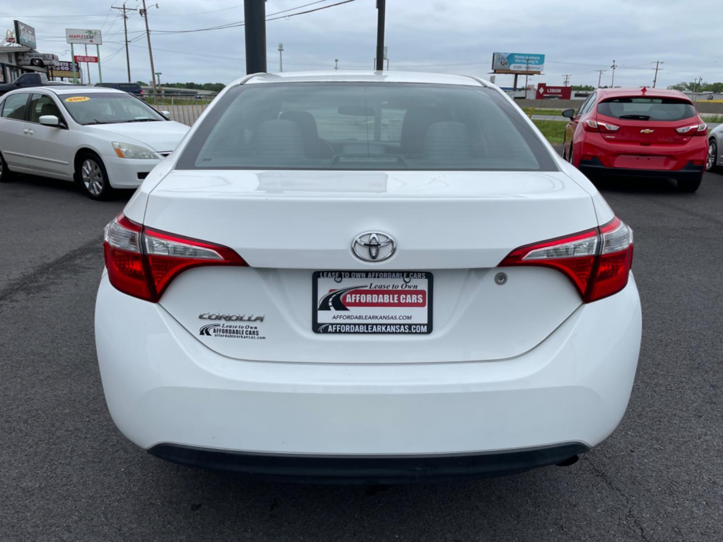 2016 White Toyota Corolla (5YFBURHE8GP) with an 4-Cyl, 1.8 Liter engine, Automatic, CVTi-S transmission, located at 8008 Warden Rd, Sherwood, AR, 72120, (501) 801-6100, 34.830078, -92.186684 - Photo#6